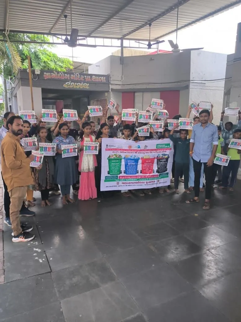 School students holding printed banners during a cleanliness awareness rally