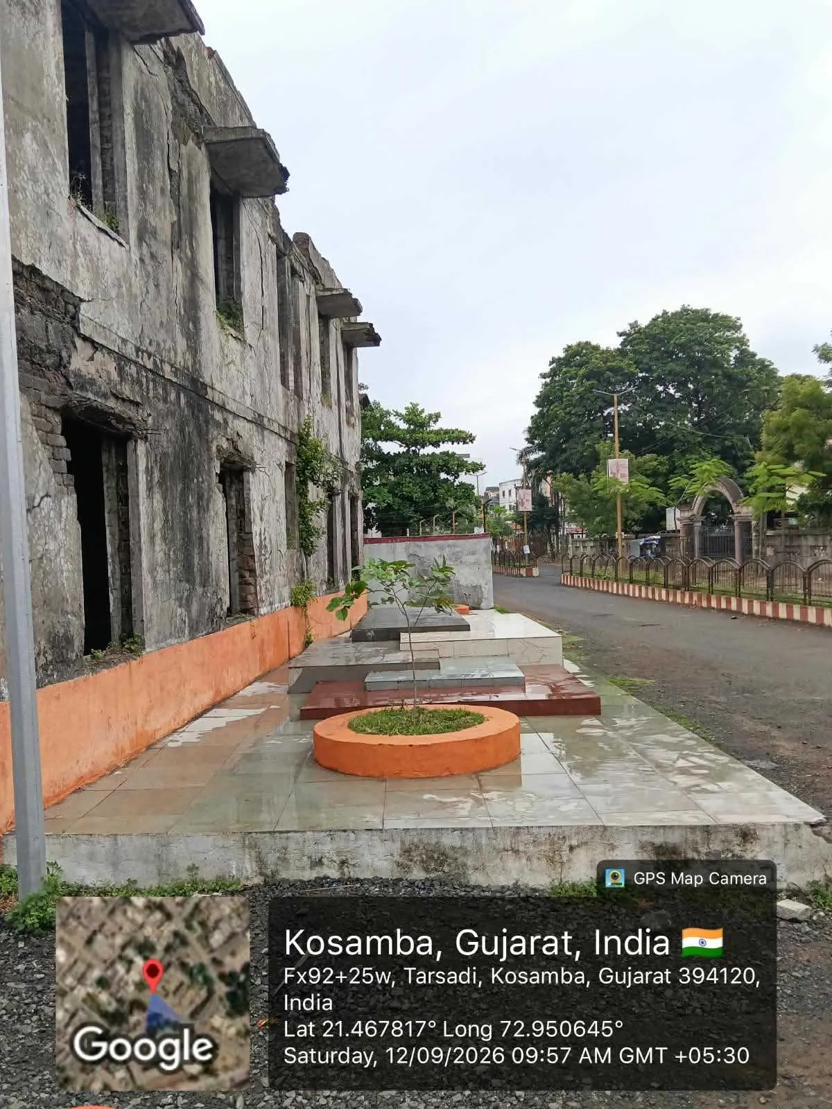 A cleared and maintained public plot on a residential street at Kosamba